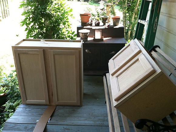 we had ZERO storage here, now Ive stained at least a dozen cabinets for the bathroom and living room