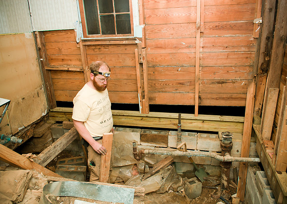 repairing the foundation and floor.
