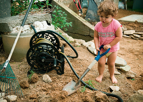 helping me plant flowers.